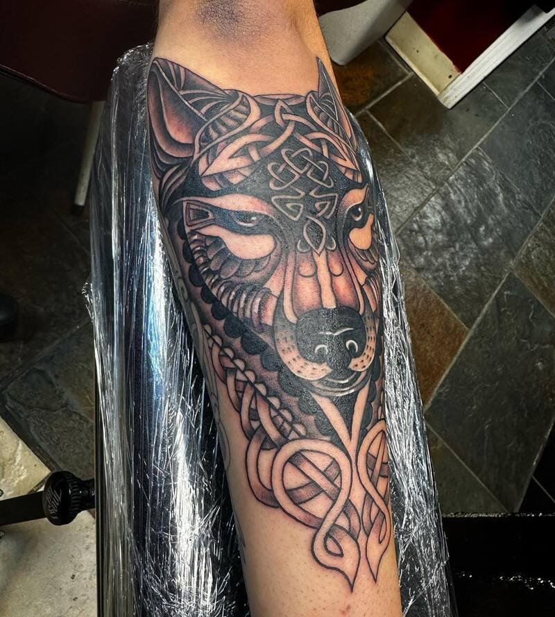 Celtic wolf forearm sleeve with knotwork for men