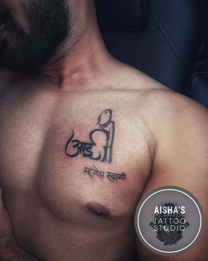 small-hindu-om-symbol-chest-tattoo-men-spiritual-2025