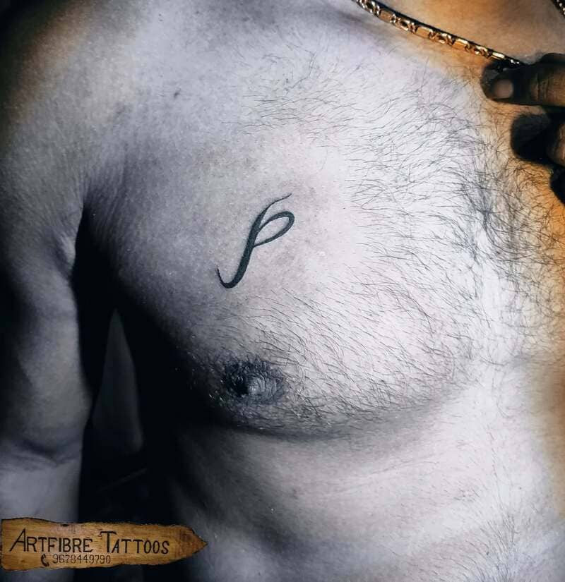single-letter-small-simple-chest-tattoo-men