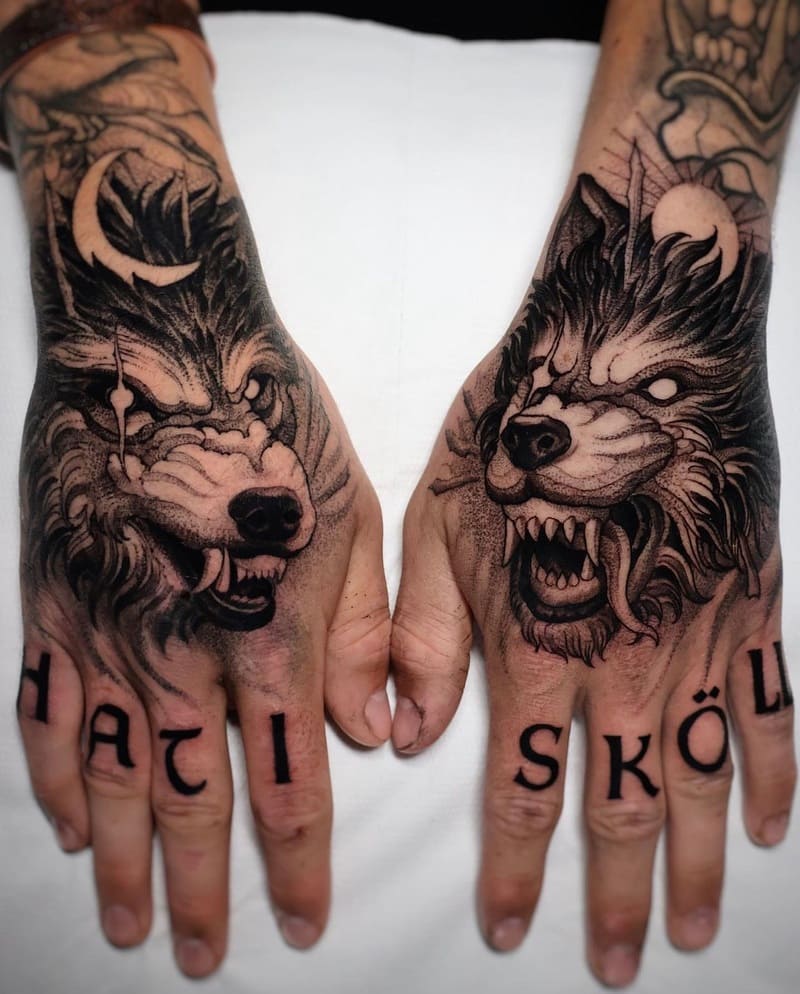Dual snarling wolf hand tattoos with text for men