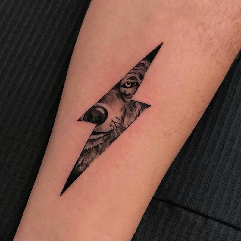 Lightning bolt wolf portrait arm tattoo for men