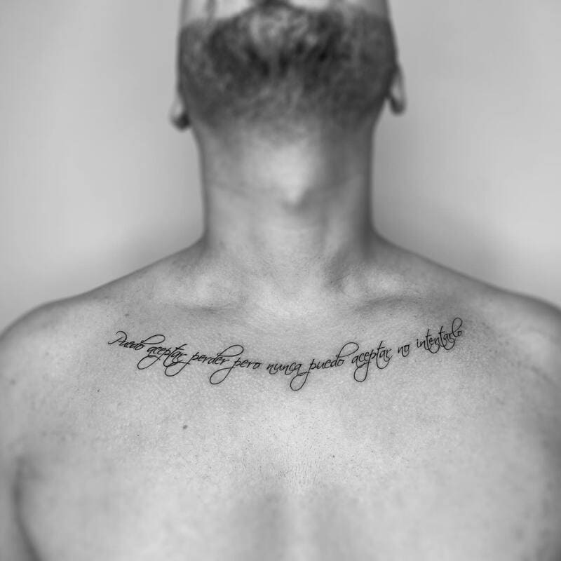 spanish-quote-small-chest-tattoo-men