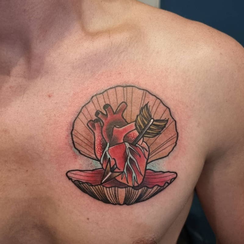 heart-shell-small-meaningful-chest-tattoo-men