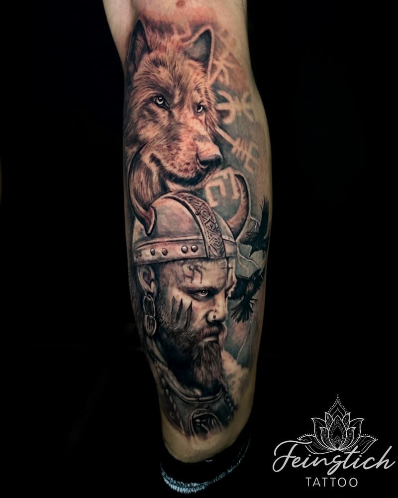 Viking warrior and wolf realistic arm tattoo for men