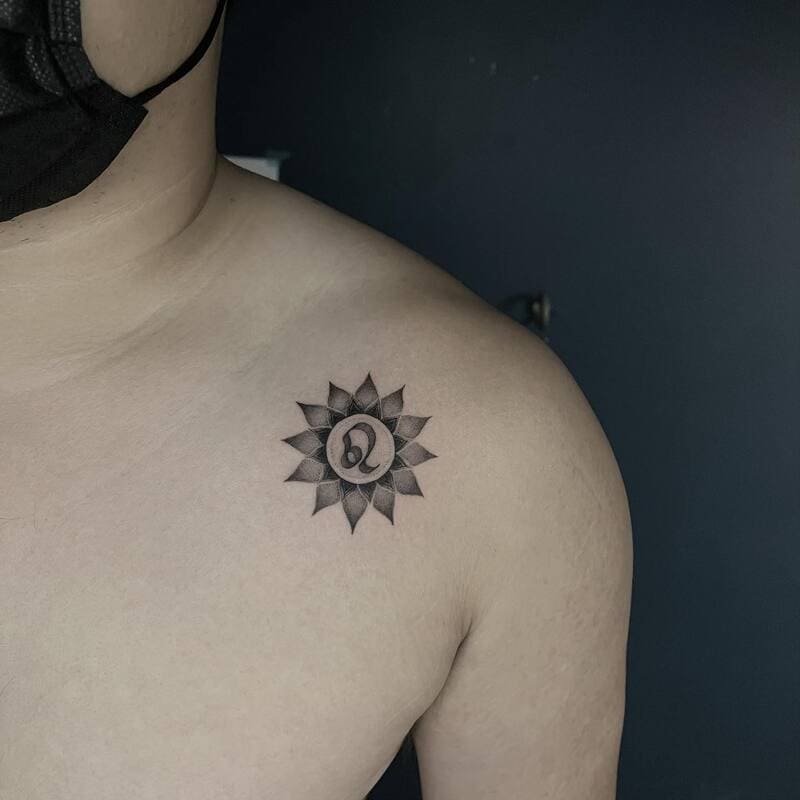 small-initial-mandala-chest-tattoo-men-geometric