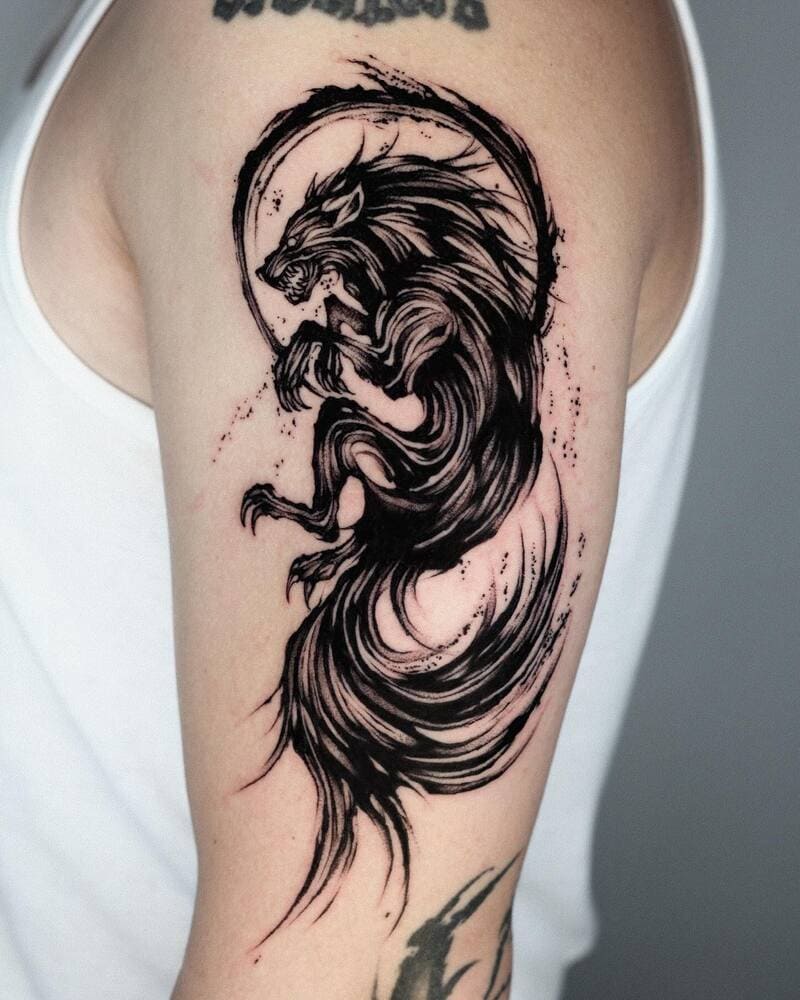 Minimalist lone wolf silhouette arm tattoo for men