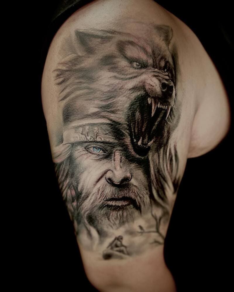 Viking elder with snarling wolf headdress tattoo for men