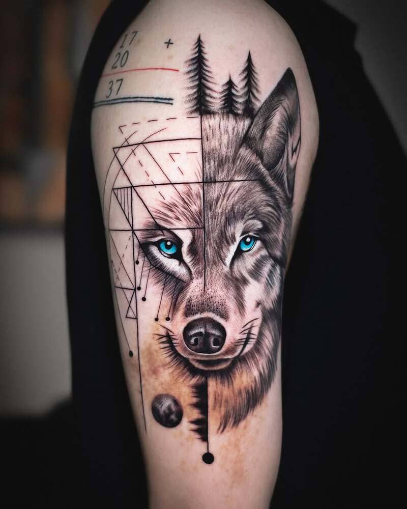 Geometric and realistic wolf with blue eyes arm tattoo for men