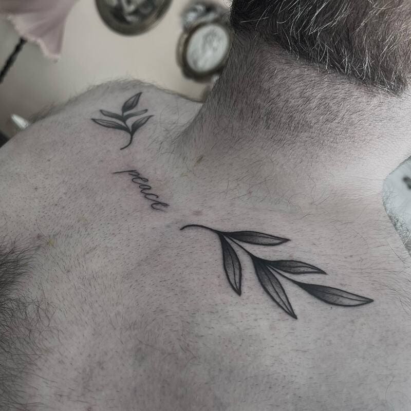 peace-leaf-small-meaningful-chest-tattoo-men