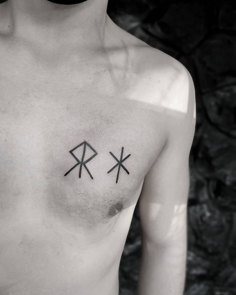nordic-runes-small-simple-chest-tattoo-men