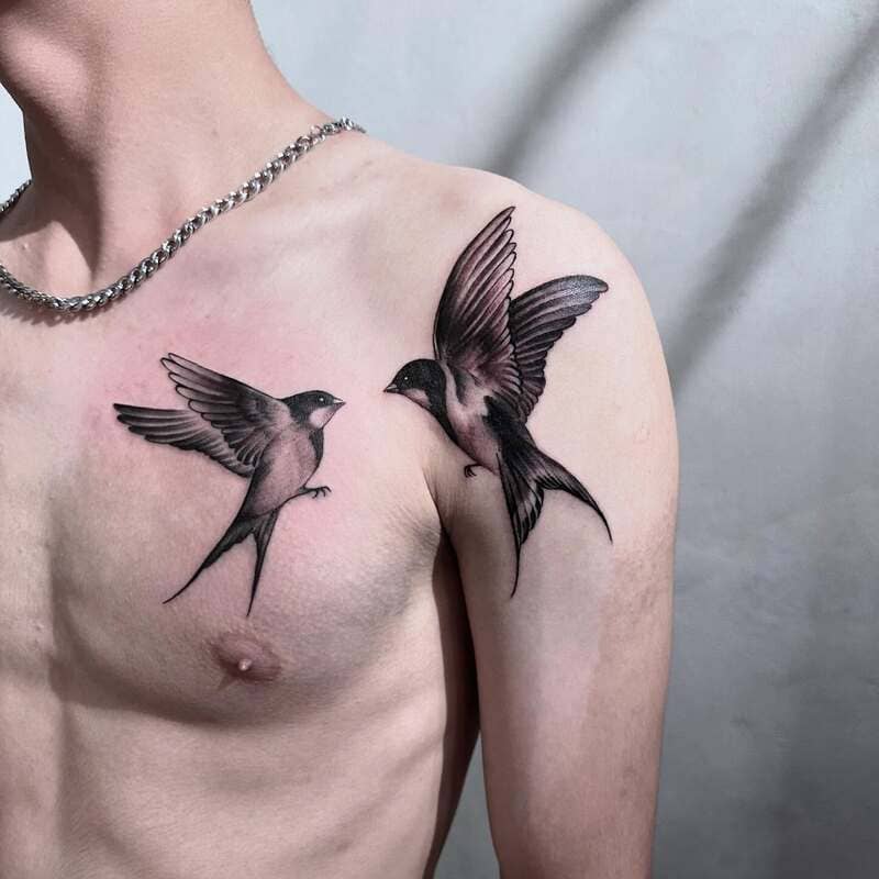 Realistic swallow chest tattoo design for men