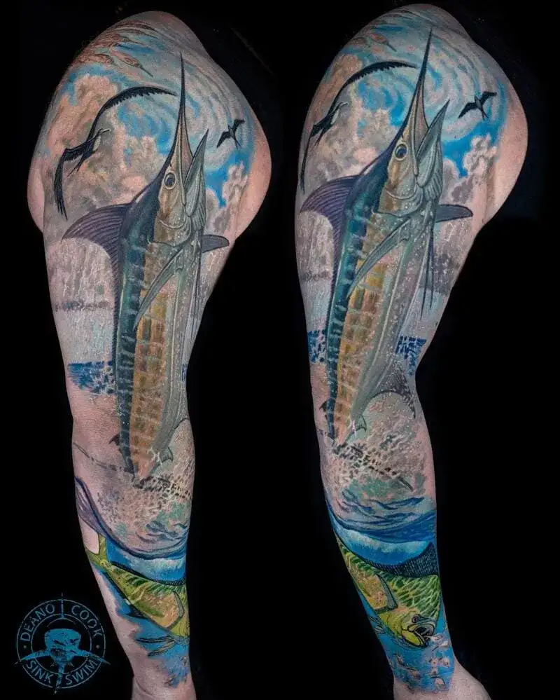 Realistic marlin sportfishing ocean sleeve tattoo for men with vibrant blue water and sky
