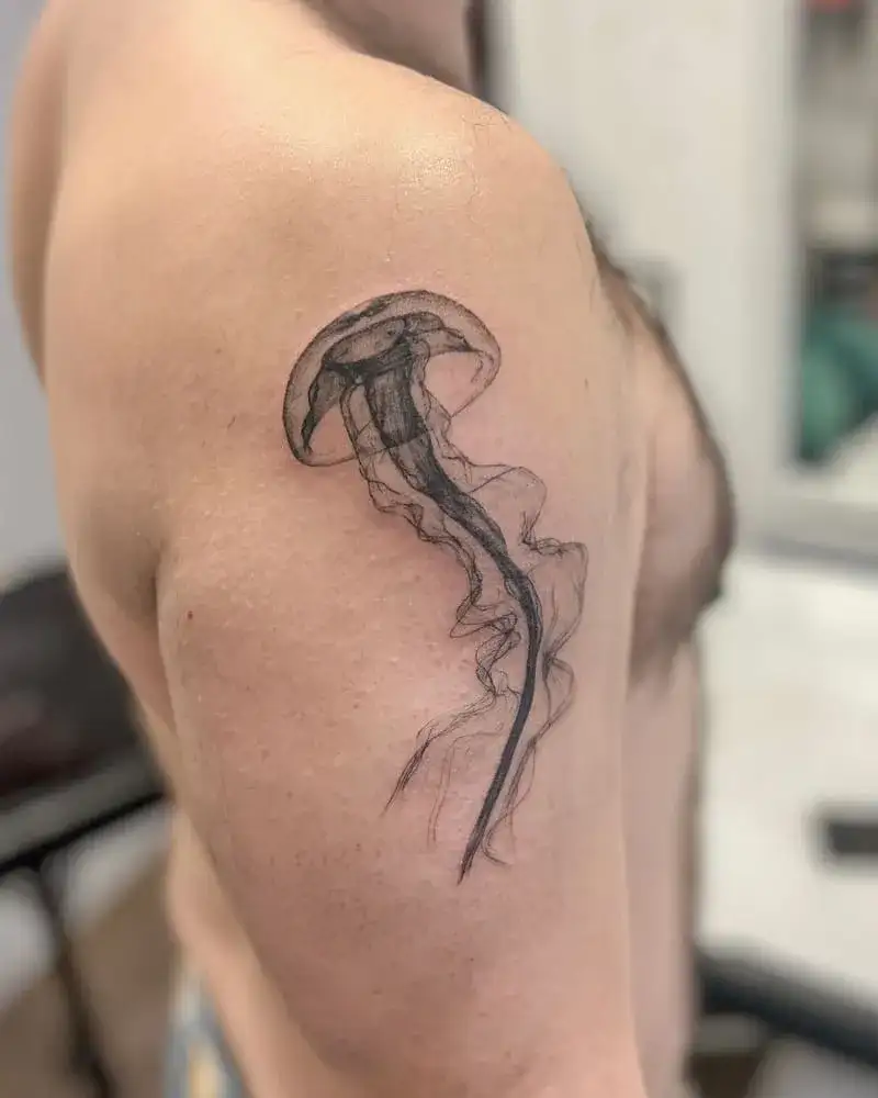 Minimalist jellyfish line work ocean tattoo for men with flowing tentacles