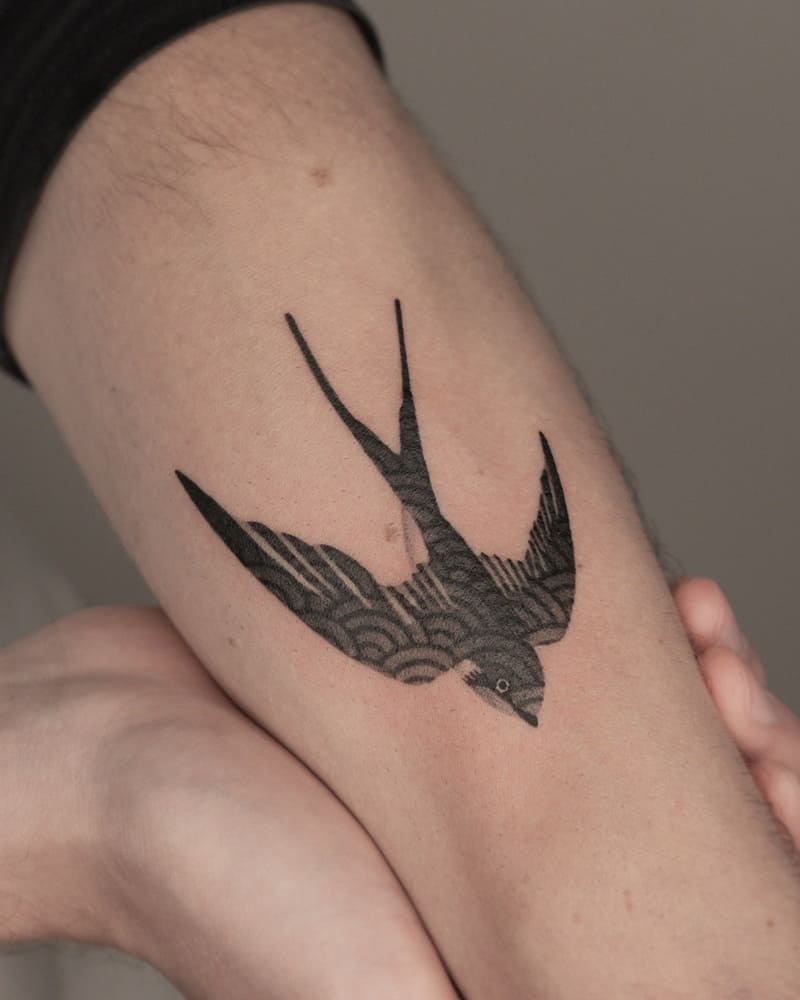Single diving swallow forearm tattoo design for men