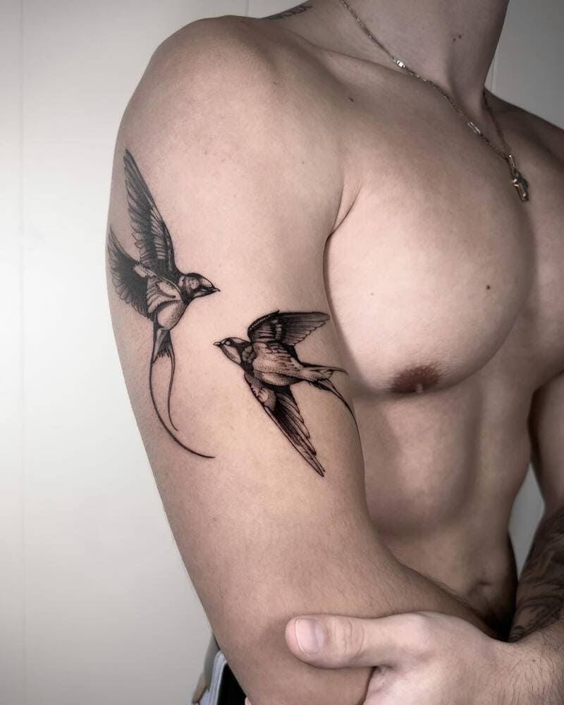 Triple dotwork swallow upper arm tattoo design for men