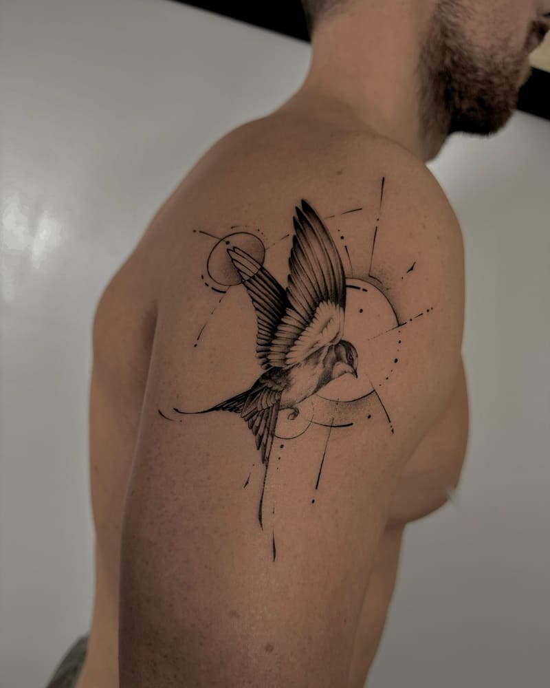 Fine line geometric swallow shoulder tattoo design for men