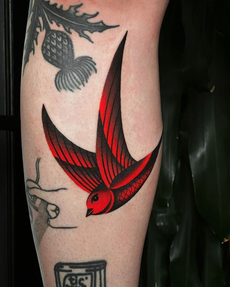 Red wing neo traditional swallow forearm tattoo design for men