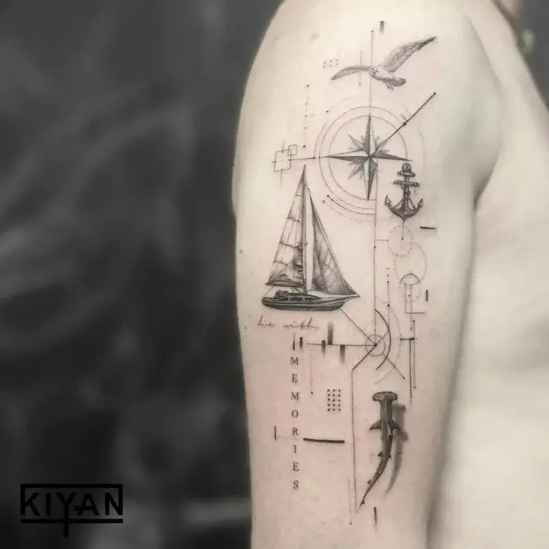 Geometric nautical compass with sailboat and shark ocean tattoo for men