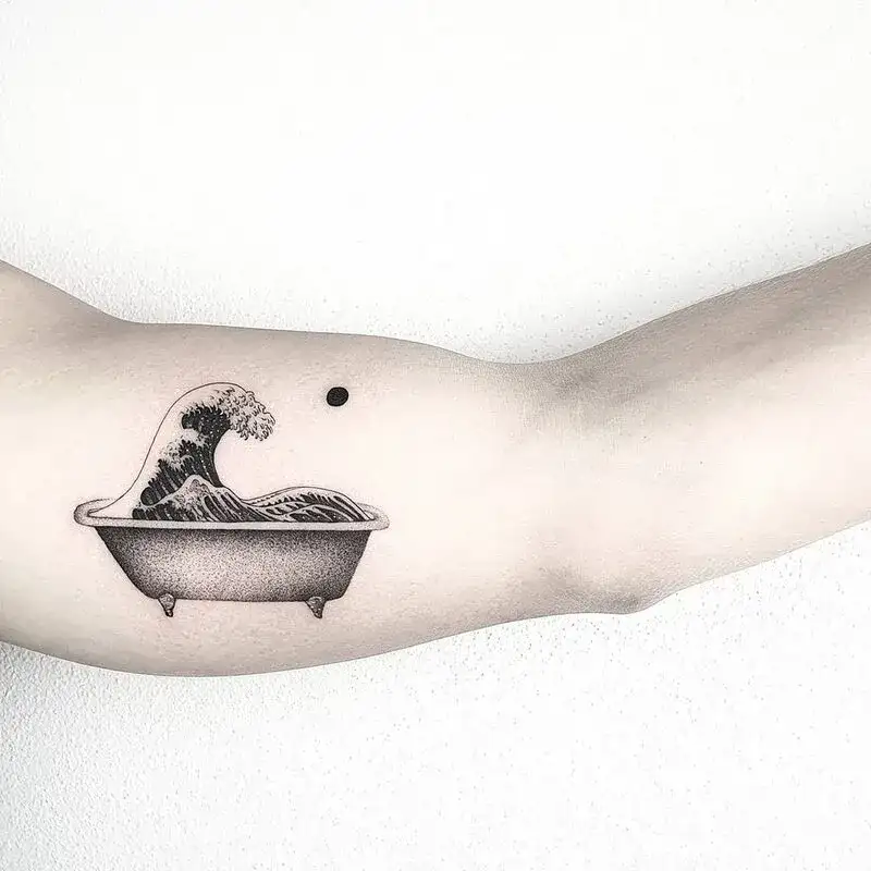 Great Wave in bathtub black work ocean tattoo for men with fine dotwork