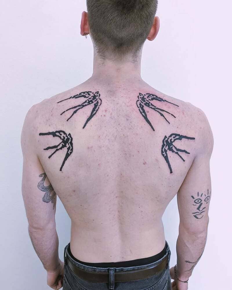 Geometric sailor swallow back tattoo design for men