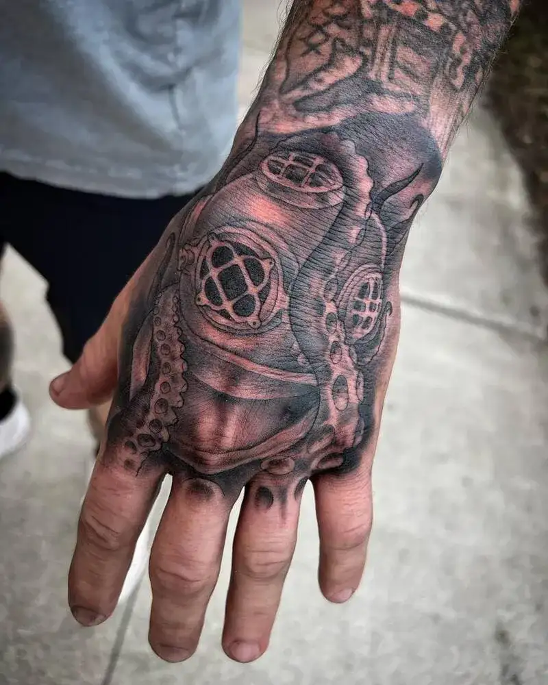 Vintage diving helmet hand ocean tattoo for men with octopus tentacle accents