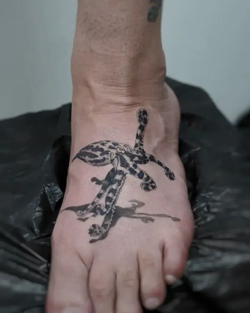 Detailed blue-ringed octopus foot ocean tattoo for men with realistic texture