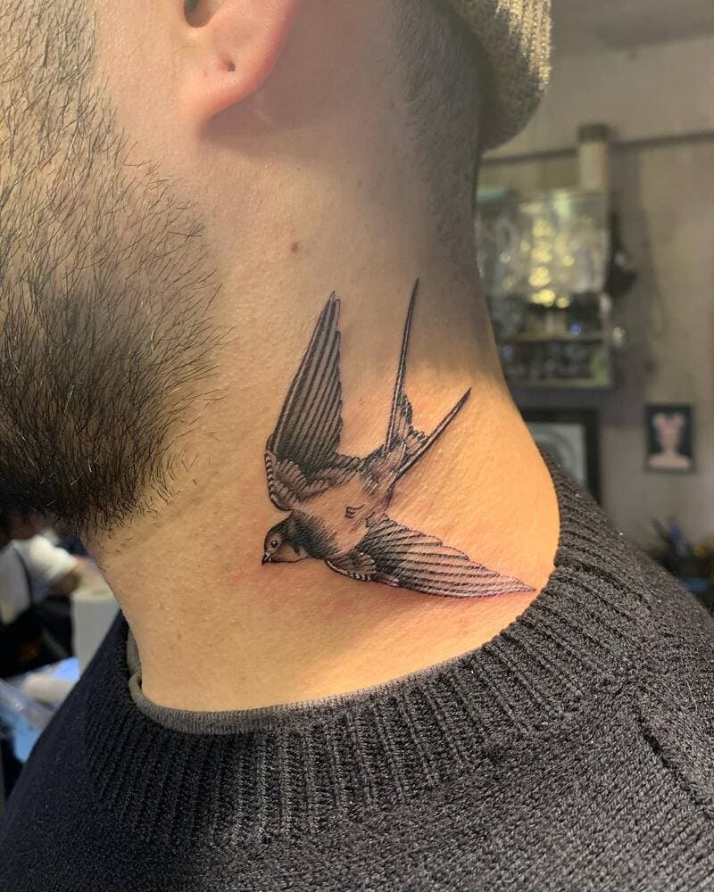 Traditional swallow neck tattoo design for men